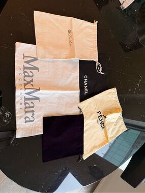 CHANEL Black Dust Bag with Mixed Brand Cloth Pouches